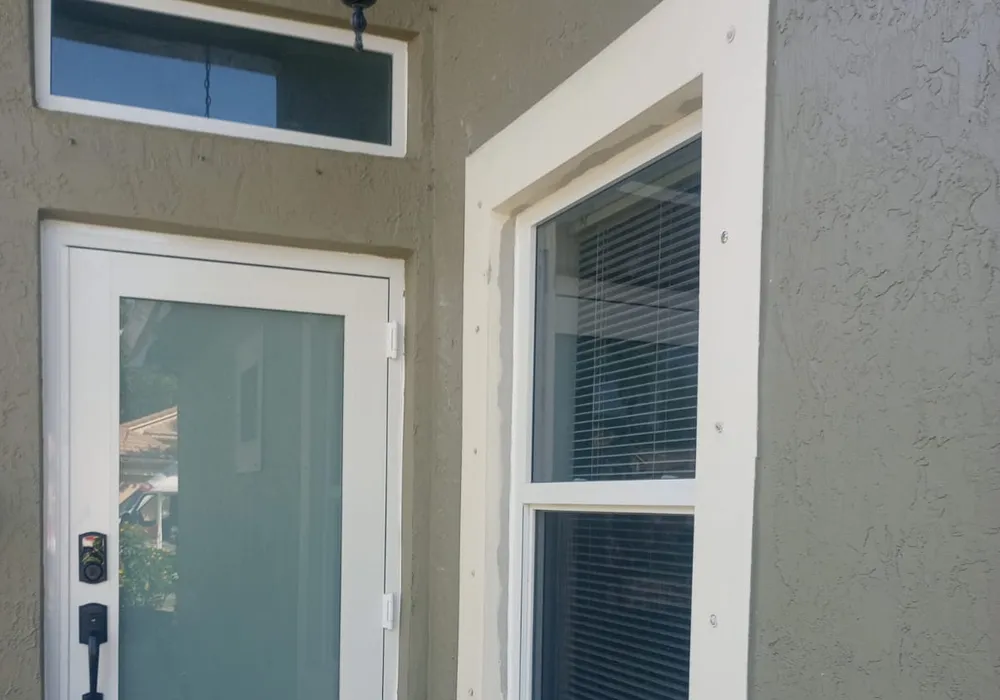 Impact-rated entry door and transom